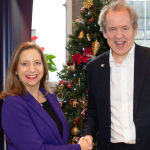 Image of Dame Clare Barclay and Professor Duncan Ivison shaking hands