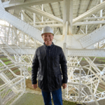 David Morris MP with a helmet in Jodrell Bank