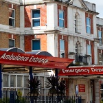 An image of an an entrance to a hospital. 