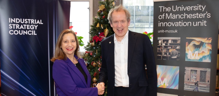 Image of Dame Clare Barclay and Professor Duncan Ivison shaking hands