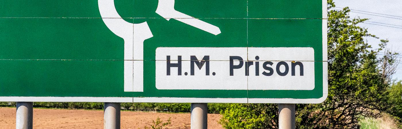 Image of HM prison road sign