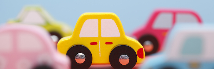 Picture of a toy car on a blue background