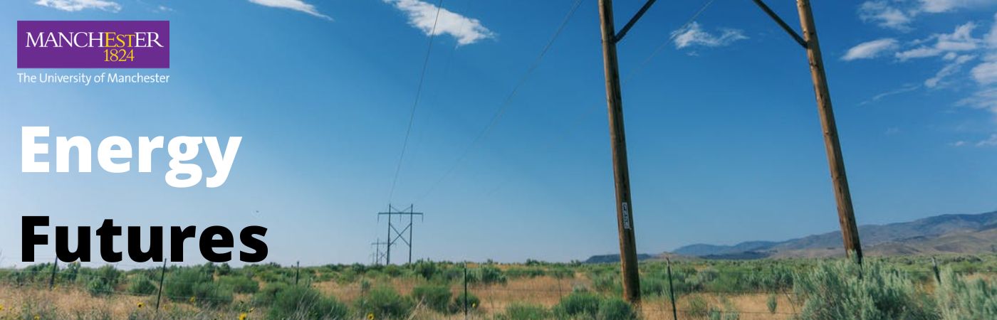 energy futures - desert landscape with turbines and pylons